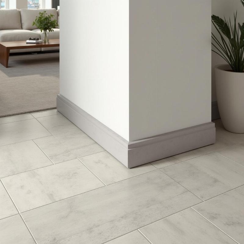 Gạch ốp chân tường 60x90 trong không gian phòng khách hiện đại, bảo vệ tường và tăng thẩm mỹ.